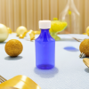 4 oz Blue Graduated Oval RX Bottles with Child-Resistant Caps